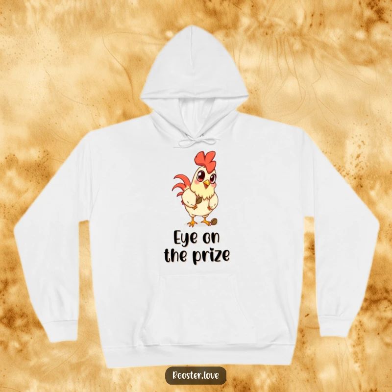 Funny cartoon rooster with exaggerated large eyes, intently pecking a seed, featured on a warm and humorous hoodie.